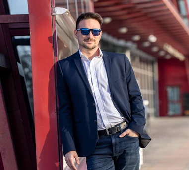 Roland in business attire